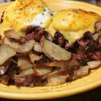 Irish Benedict · Slow roasted corned beef hash atop a golden corn muffin topped with two eggs and rich Hollan...