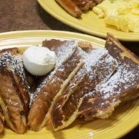 French Toast Combo · 6 triangles of traditional French toast, 2 eggs, and choice of 4 bacon strips, 4 sausage lin...