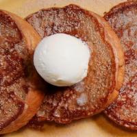 Cinnamon French Toast · 3 slices of homemade cinnamon bread dipped in cinnamon batter and grilled golden brown, spri...