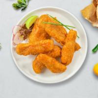 High & Buffalo Tenders · Breaded chicken tenders, fried until golden brown and tossed in buffalo sauce. Served with a...