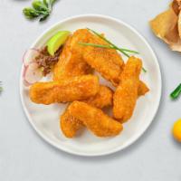 Flaming Mango Habanero Tenders · Breaded chicken tenders, fried until golden brown and tossed in mango habanero sauce. Served...