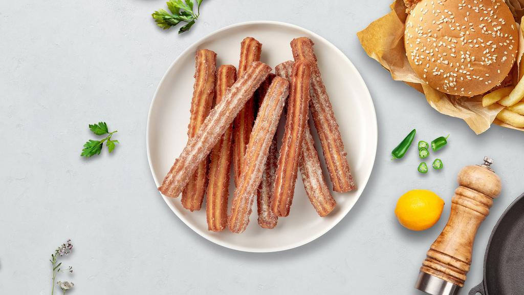 Champ'S Churros  · This sensation is well worth all the hype. Cinnamon sugar-dusted churro disks served with your choice of dipping sauce.