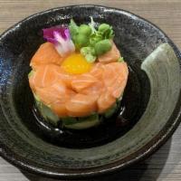 Salmon Tartare · Avocado base top with salmon, quail egg, wasabi tobiko