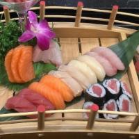 Sushi For Two · 8pcs sashimi, 10pcs nigiri, rainbow roll, tuna roll