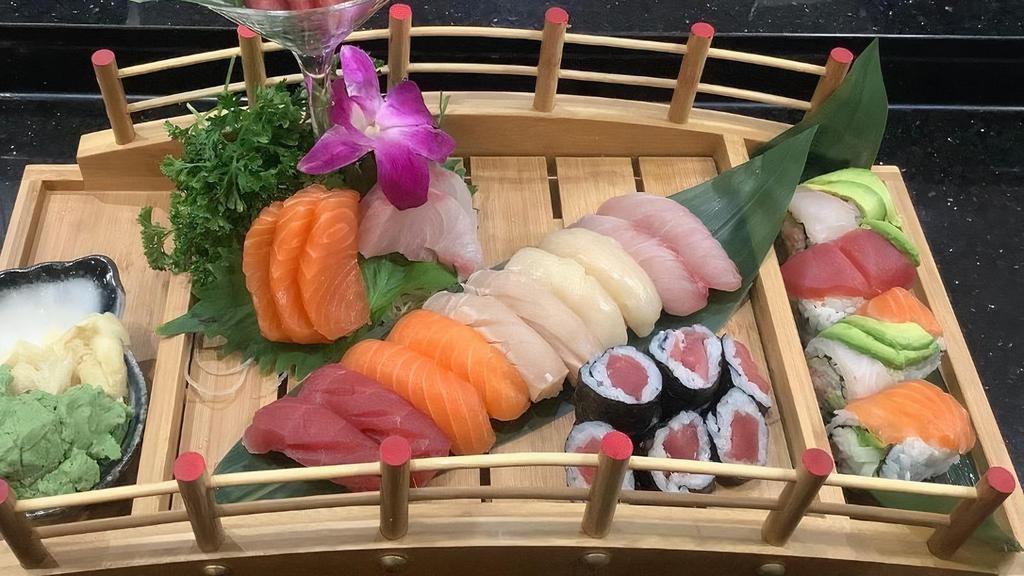 Sushi For Two · 8pcs sashimi, 10pcs nigiri, rainbow roll, tuna roll