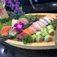 Sushi Love Boat · 15pcs sashimi, 12pc nigiri, Osaka sushi roll and 1 chef's choice roll