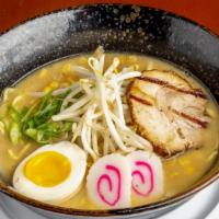 Sapporo Miso Ramen · Grilled sliced roasted pork, egg, bean sprouts, corn , white onion sautéed with garlic Butte...