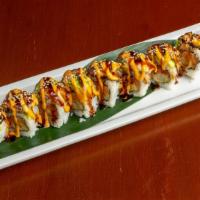Dragon Roll · Shrimp tempura, salmon. Topped  with unagi, avocado drizzle with spicy mayo and sweet unagi ...
