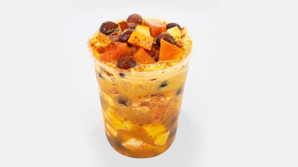 Tornado · this product is a cup with 7 different fruit prepared with an orange juice with lemon and tajin