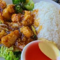 Sesame Scallops · Hot and spicy. Lightly fried scallops tossed in a sweet and spicy sesame sauce served over s...