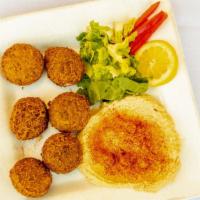 Falafel (6 Pieces) · Six chickpeas croquettes served with tomatoes pickles and amba sauce.