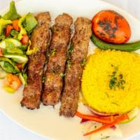 Beef Kebab · 3 skewers seasoned ground beef mixed with chopped parsley, onions charbroiled and served ove...