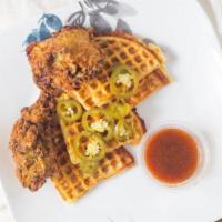 Chicken & Waffles · Buttermilk fried chicken breast, white cheddar cornmeal waffle, pickled jalapeños, and bacon...
