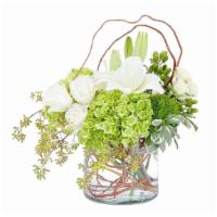Chic & Styled · A naturally styled combination of lilies roses and hydrangea in a clear vase accented with c...