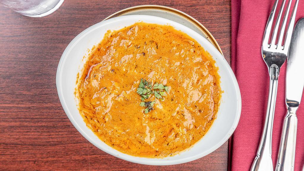 Butter Chicken · Gluten free. Boneless chicken cooked with ground spices, onion and tomato in creamy and butter sauce.