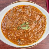 Lamb Curry · Gluten free. Boneless lamb cooked with traditional curry sauce.