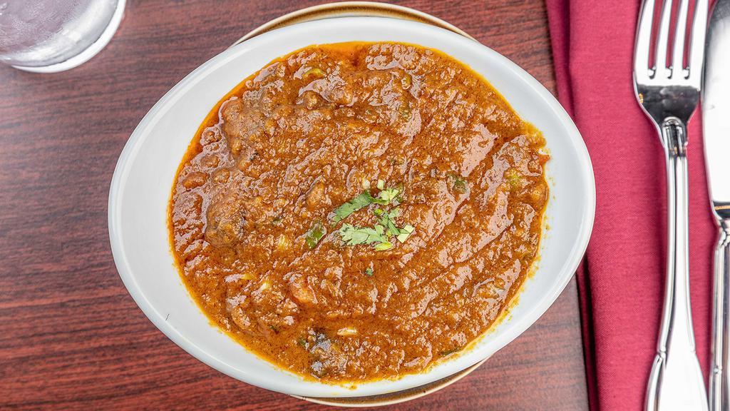 Lamb Curry · Gluten free. Boneless lamb cooked with traditional curry sauce.