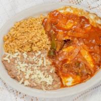 Huevos Rancheros · Two eggs cooked over easy smothered in choice of green or red salsa.