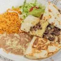 Quesadilla Ranchero · A large flour tortilla filled with your choice of chicken or beef and cheese.