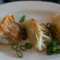 Potstickers! · Pork, ginger, garlic, and local cabbage potickers steamed and seared to order. Served with d...