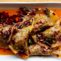 Sichuan Duck Dumplings · Sichuan style Duck dumplings with chile crunch oil and black vinegar. (5 pcs per order)