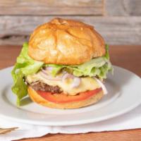 Farm Burger · Grass-fed burger topped with raw cheese and the works: tomato, lettuce, onion, pickles, hous...