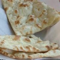 Plain Naan · Made with fine flour, egg, milk and spices.