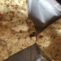 Keema Naan · Naan stuffed with ground spiced chicken or lamb.