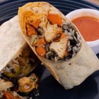 Veggie Burritos · 12” Flour Tortilla with Cilantro lime rice, Seasonal Veggies, Onions, Cilantro, Arbol Salsa,...