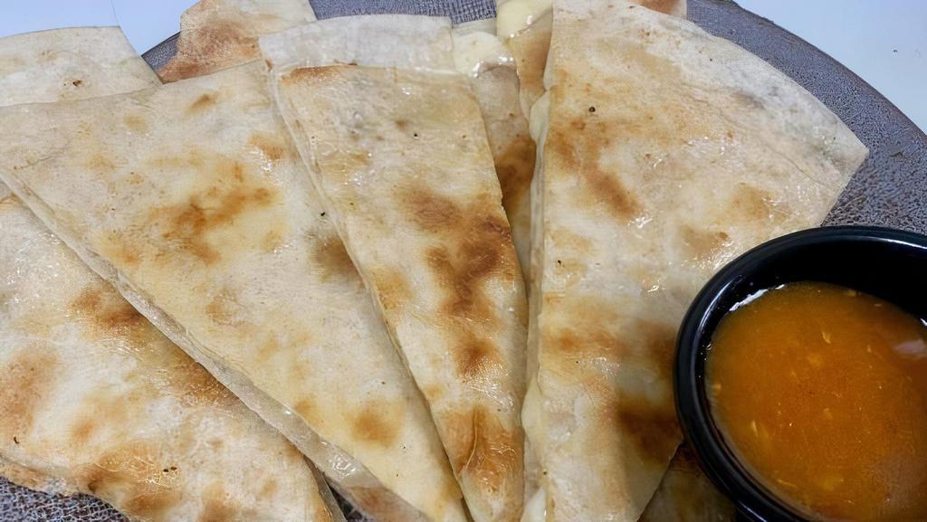 Build Your Own Quesadillas · Build Your Own Cheesy Quesadilla Creation.