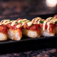 Crispy Rice With Tuna · Deep-fried rice topped with spicy tuna and sliced jalapeños and served with chipotle mayo an...