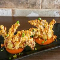 Deep-Fried Soft Shell Crab · Deep-fried soft shell crab served with carrot puree, eel sauce and creamy all sauce.