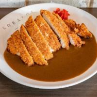 Chicken Katsu · Chicken breaded with nama panko (fresh panko) deep fried to a crisp and served with nice and...