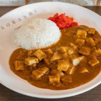 Beef Stew Curry · Slow-cooked marinated beef served with  curry and rice.