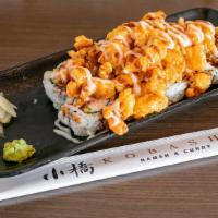 Popcorn Lobster Roll · Sushi roll filled with crab meat and avocado topped with popcorn lobster, yum yum sauce and ...