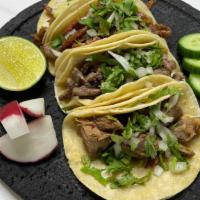 Taco De Barbacoa *Only Weekends* · Served with onion and cilantro
