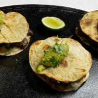 Mulitas · 3 Mulitas Your choice of meat, mozzarella cheese, onion, cilantro, and guacamole on corn tor...