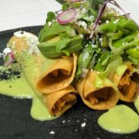 Flautas De Barbacoa **** Only Weekends**** · 5 Deep-fried  tortillas rolled with lamb (BARBACOA), topped with guacamole sauce, lettuce, t...