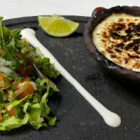 Queso Fundido · Melted mozzarella cheese dip with your choice of corn or flour tortillas and a side of pico ...