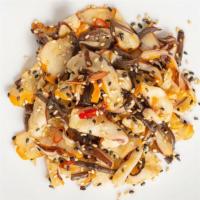Squid Salad · Tender, thinly sliced squid, scallions , chili peppers and wood ear mushrooms marinated in a...