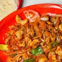 Arroz Con Pollo · Tender sliced chicken breast with mushrooms, tomatoes, onions, and green peppers. Served on ...