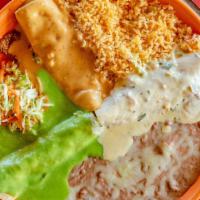 Enchiladas Divorciadas!!! · Three enchiladas. one chicken, one cheese and one ground beef each covered with different sa...