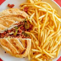 Tortas · Mexican styled sandwich, toasted bread layered with beans, mayo, and your choice of meat: al...