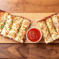 Cheesy Bread · Mozzarella cheese, romano cheese, parmesan cheese, and parsley. Served with san marzano red ...
