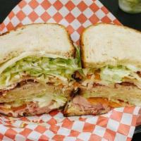 Triple Decker Club For Two · House smoked real turkey and hickorywood slow smoked ham, thick cut applewood bacon, smoked ...