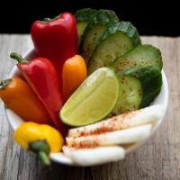 Side Vegetable Crudite · Seasonal vegetable crudité with. fresh lime and chile-lime sea salt. go great with guacamole!