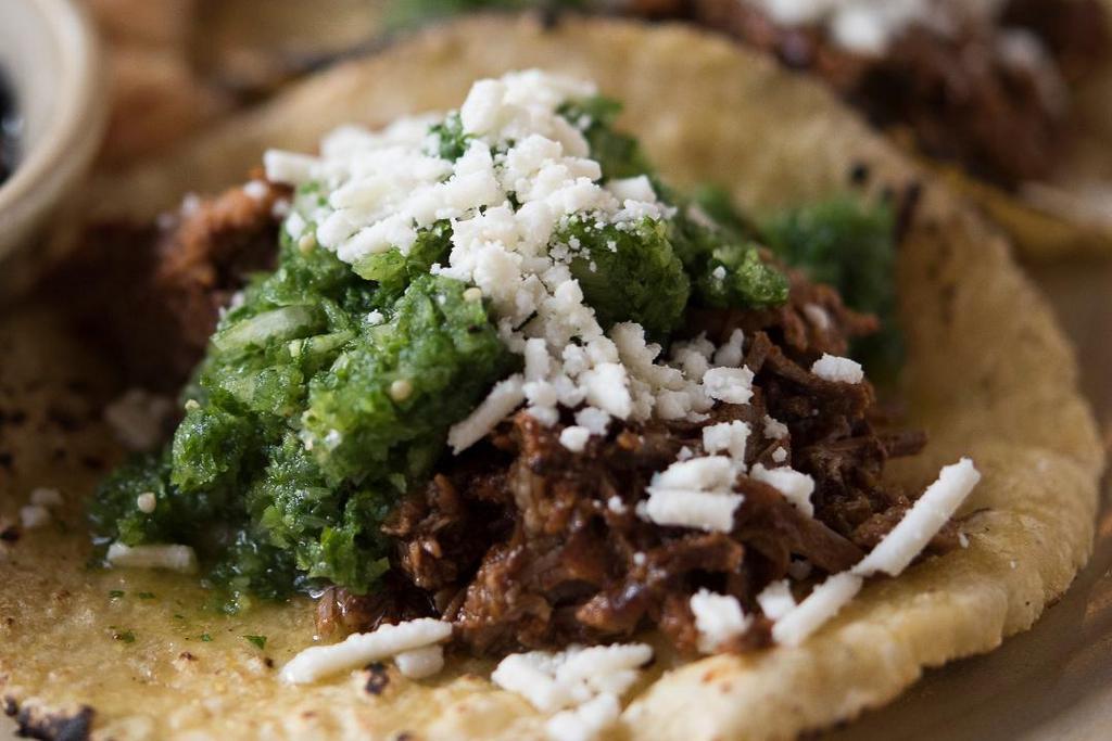 1 Taco Lamb · Anderson Ranch lamb, tomatillo-mint salsa, cotija cheese, house made corn tortillas, Spanish rice, cumin black beans. We charge 20% more for items on ALL third party delivery sites to cover the commission they charge us.  If you want to avoid this premium, we invite you to order for delivery or take-out . at www.CactusRestaurants.com.