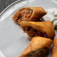 Kids Brisket Flautas · Brisket and tortilla fried and served with. guacamole and sour cream.