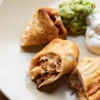 Kids Chicken Flautas · Chicken and tortilla fried and served with. guacamole and sour cream.