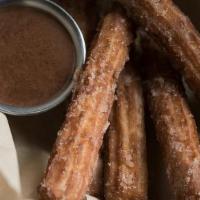 Churros · Cinnamon, sugar, warm Mexican chocolate